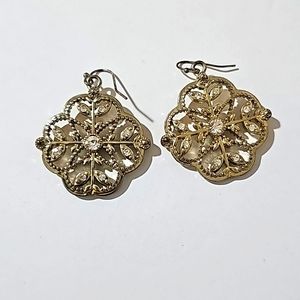 Gold tone and white crystal dangle earrings